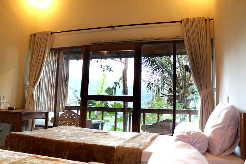 Made Oka Homestay And Warung موندوغْ الغرفة الصورة