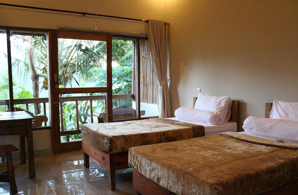 Made Oka Homestay And Warung موندوغْ الغرفة الصورة
